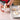 Baker hand-shaping bagel dough 