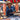 A market stall or farm scene with fresh dairy products and salmon fillets, evoking locality and freshness.  